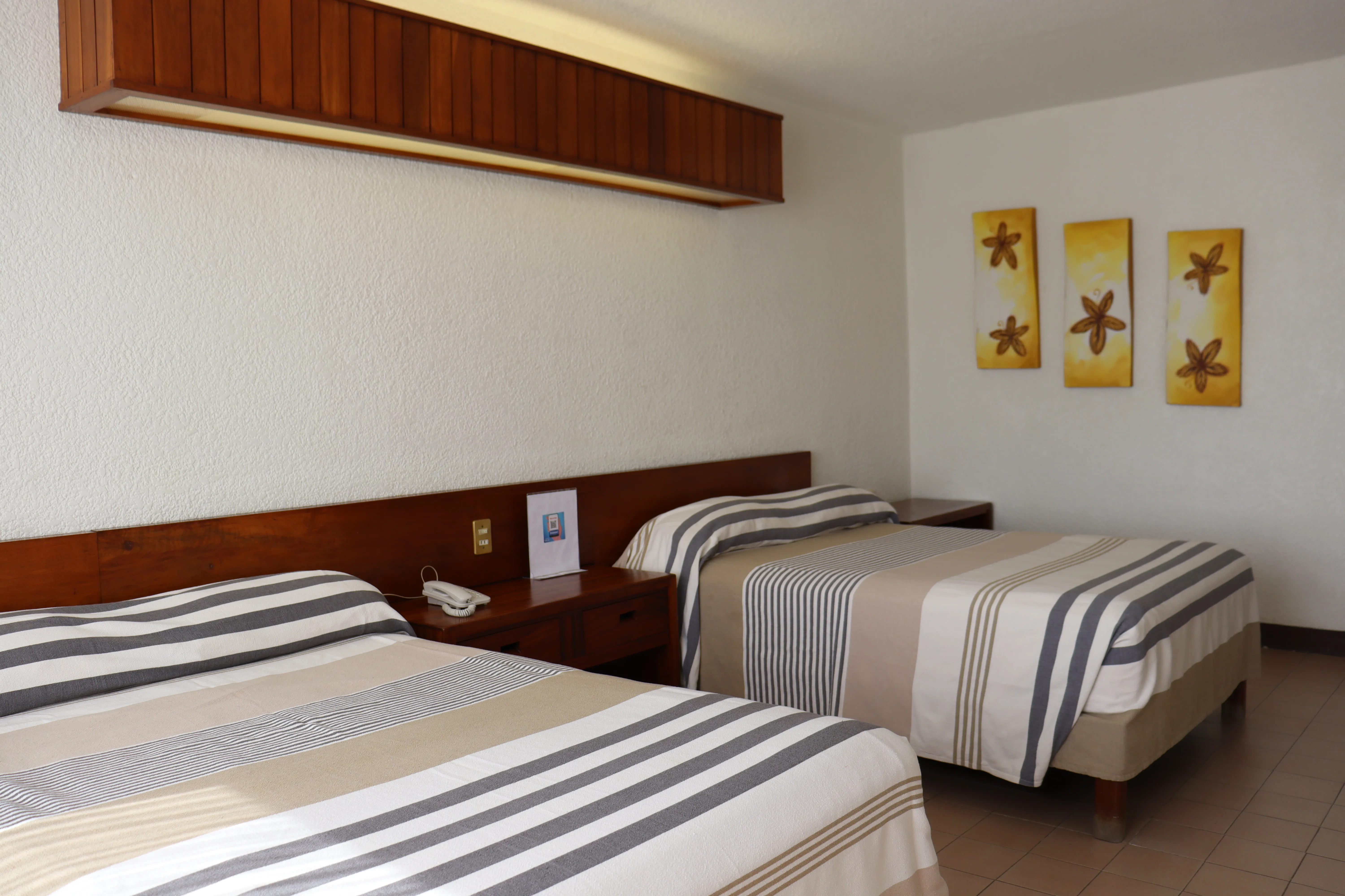 Habitación Doble con dos camas en Hotel Barlovento Puerto Escondido